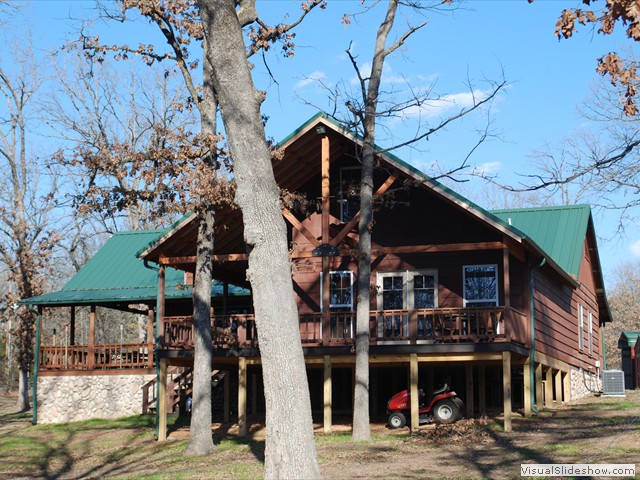 Back view of the cabin with master bedroom in close view