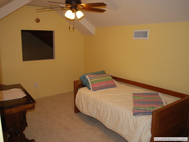 Upstairs yellow bedroom (sleeps 1) and closest to the upstairs 1/2 bath.<br/>