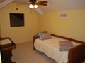 Upstairs yellow bedroom (sleeps 1) and closest to the upstairs 1/2 bath.<br/>