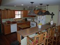 Kitchen also includes bar seating for 3.<br/>